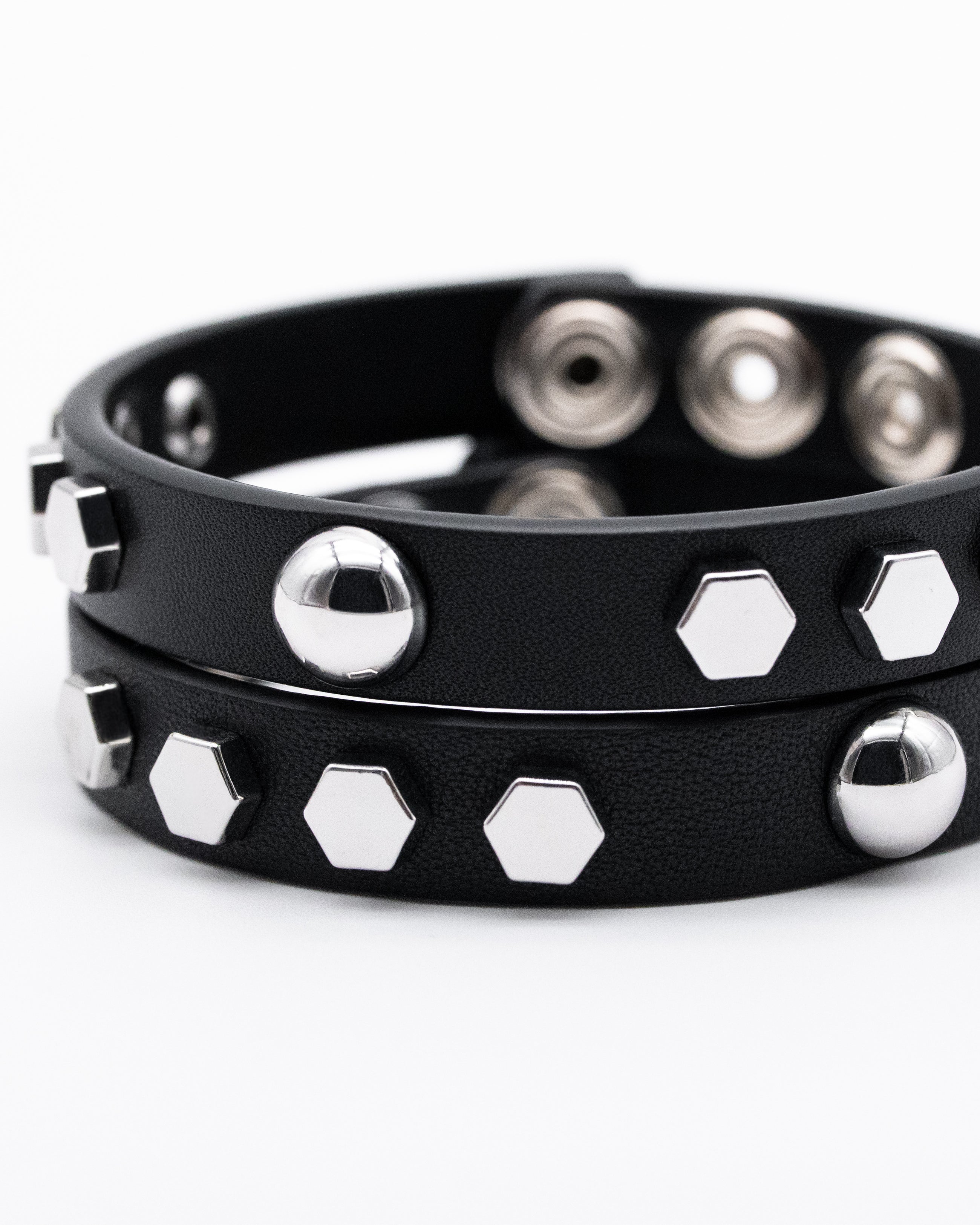 CANCCIO hexagon black leather bracelet duo with silver hexagon studs, texture detail