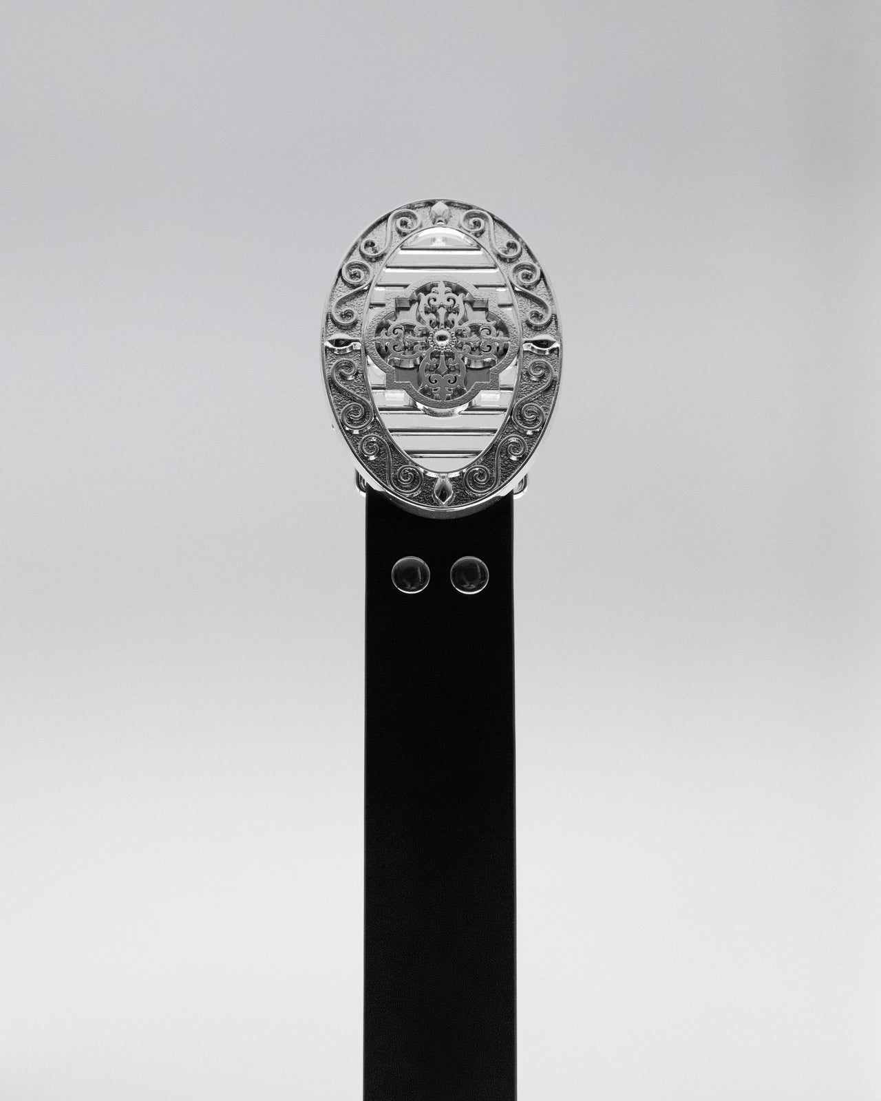 CANCCIO ORNA studded black leather belt with silver buckle, front close up