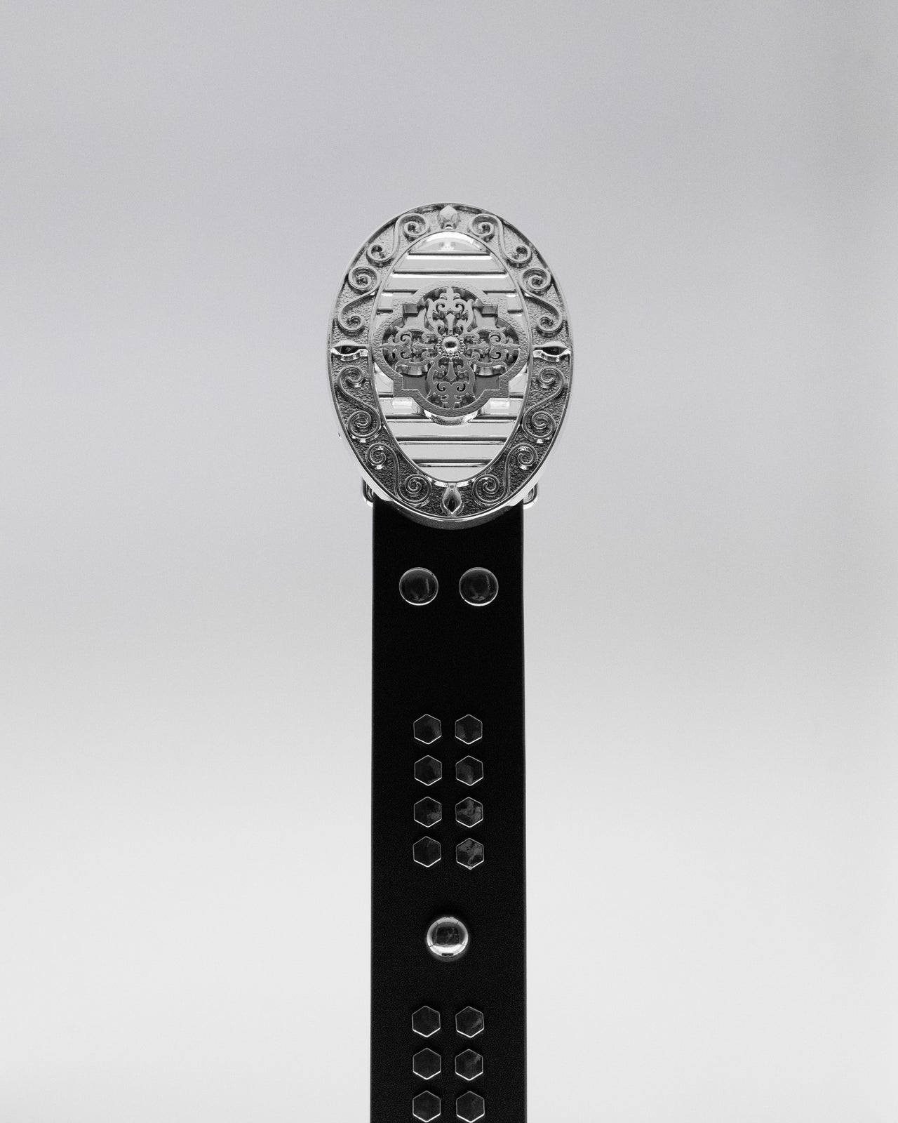 CANCCIO ORNA studded black leather belt with silver buckle, front close up
