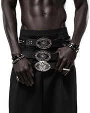 CANCCIO ORNA studded black leather belt with silver buckle, on body front close up